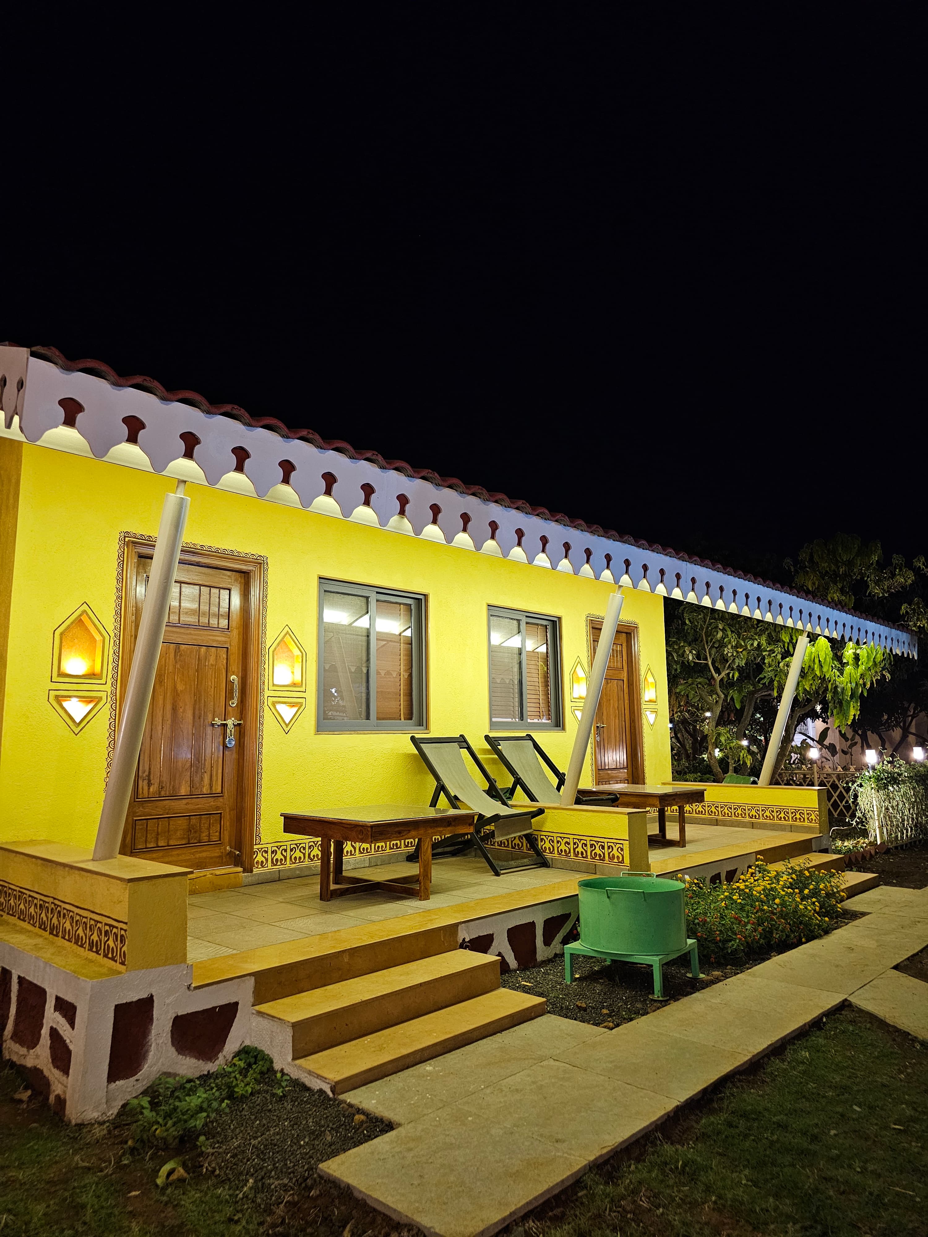 Swapna Vastu traditional stone cottage interior at SwapnaKiran farm resort Nashik